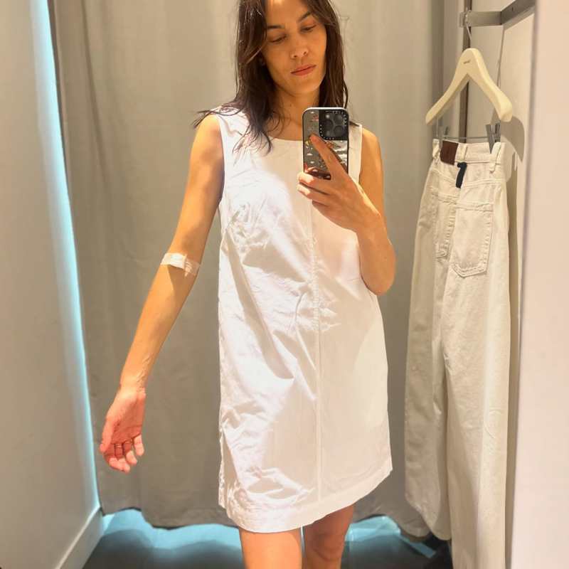 Calvin Klein Cotton Poplin Sleeveless Mini Dress worn by Alexa Chung | Alexa Chung Outfits and Style