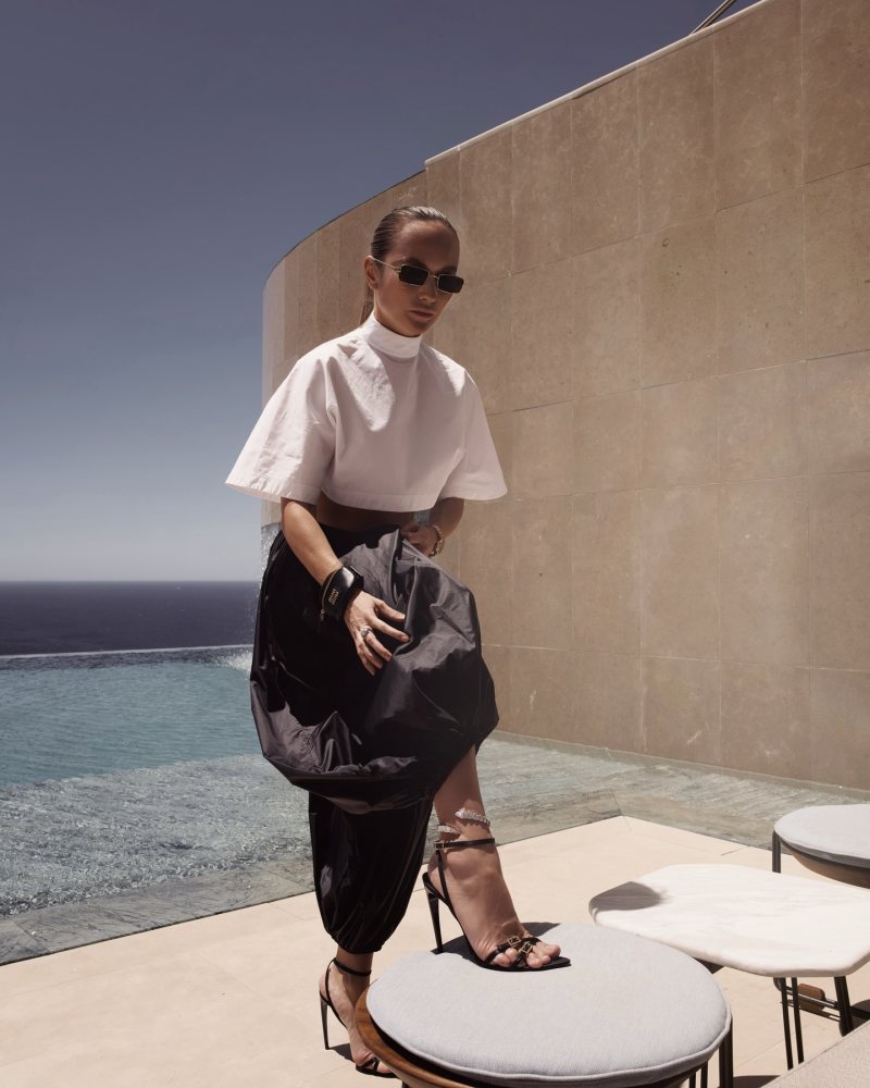 vikki_life wearing Alaia Cotton turtleneck top and SAINT LAURENT sandals