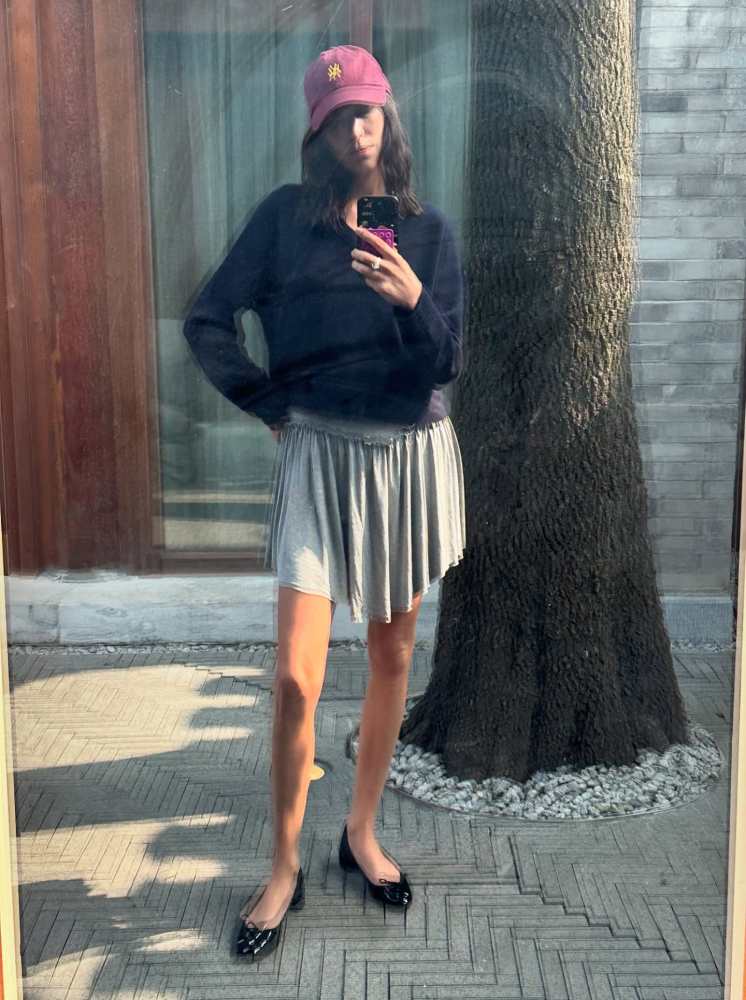 Gimaguas Gota Mini Dress and Repetto Camille ballet flats worn by Alexa Chung | Alexa Chung Outfits and Style