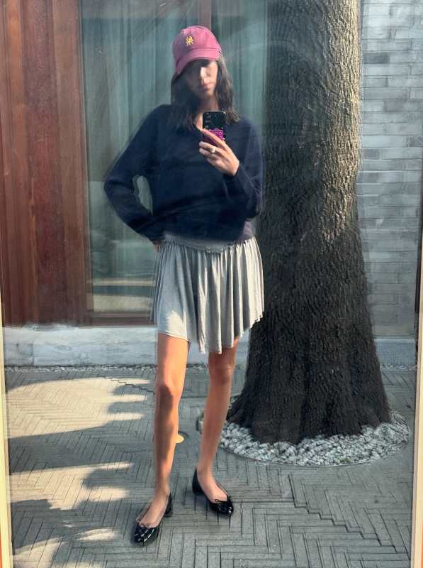 Gimaguas Gota Mini Dress and Repetto Camille ballet flats worn by Alexa Chung | Alexa Chung Outfits and Style