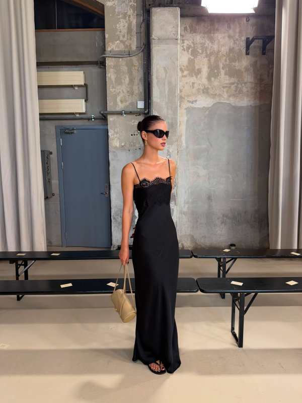 HERSKIND Asla Dress - Black, Khaite x Oliver Peoples 1967C, CHANEL 2026 Small Preppy Coco Bowling Bag and TIFFANY & CO Large Link Earrings in Yellow Gold worn by