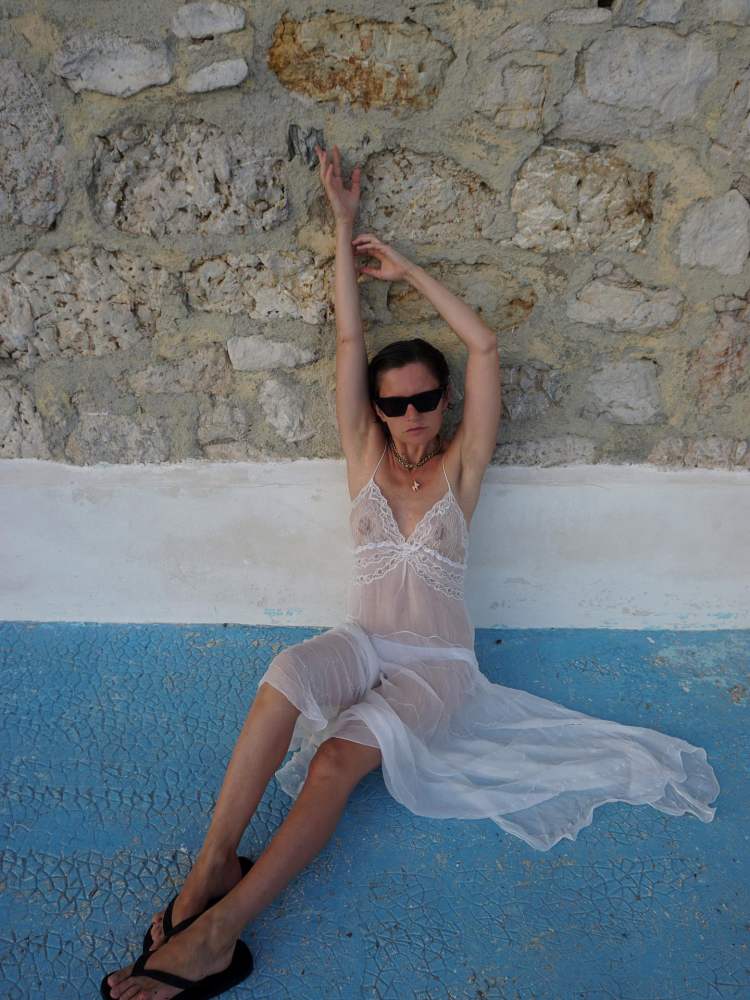 Saint Laurent Lingerie dress in silk satin crepe worn by Marta Cygan | Marta Cygan Outfits and Style