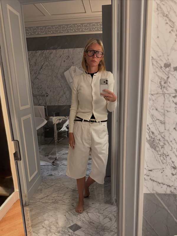 Saint Laurent oval buckle thin belt in smooth leather, GWYN Blythe Cardigan, PHOEBE PHILO CARPENTER SHORTS in pale blush Cotton and CADDIS Root Cause Analysis Frame worn by Gwyneth Paltrow | Gwyneth Paltrow Outfits and Style