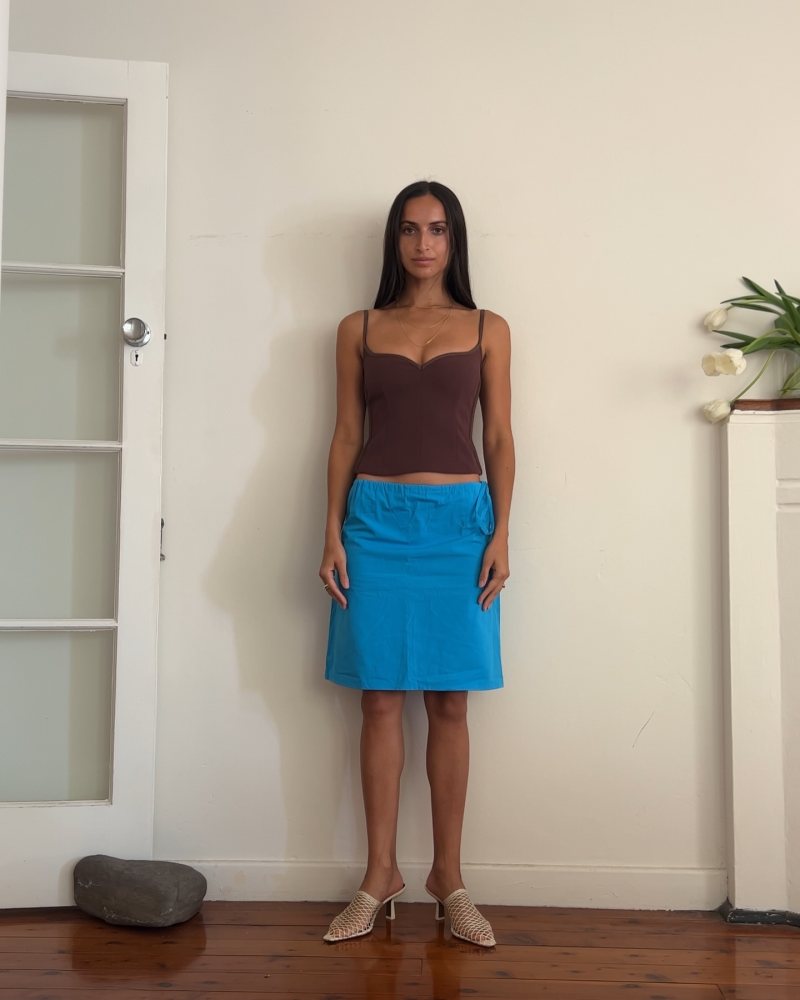 Paris Georgia Brown Heart Camisole and NEOUS Off-White Bophy Mules worn by Bella Thomas | bellathomas's closet