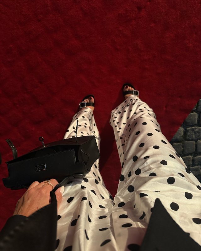 Saint Laurent Simone 90 embellished satin crêpe mules, Dolce & Gabbana Polka-dot silk twill pajama pants and HERMES Kelly Bag worn by Viky Rader | vikyrader's closet