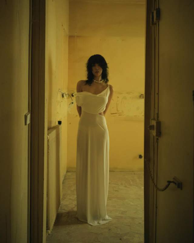 AMAZUÌN ISELIN. Asymmetrical plunge neck maxi dress worn by Xiayan Guo | gxiayan's closet