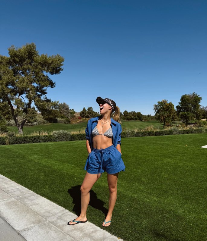 Matteau Blue Relaxed Shirt, Matteau Blue Relaxed Shorts and The Row Beach Flip Flop worn by Sofia Richie Grainge | Sofia Richie Grainge Outfits and Style
