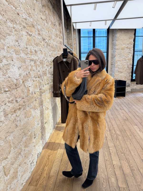 Saint Laurent Shearling coat worn by Kseniya Shipilova | Kseniya Shipilova Outfits and Style