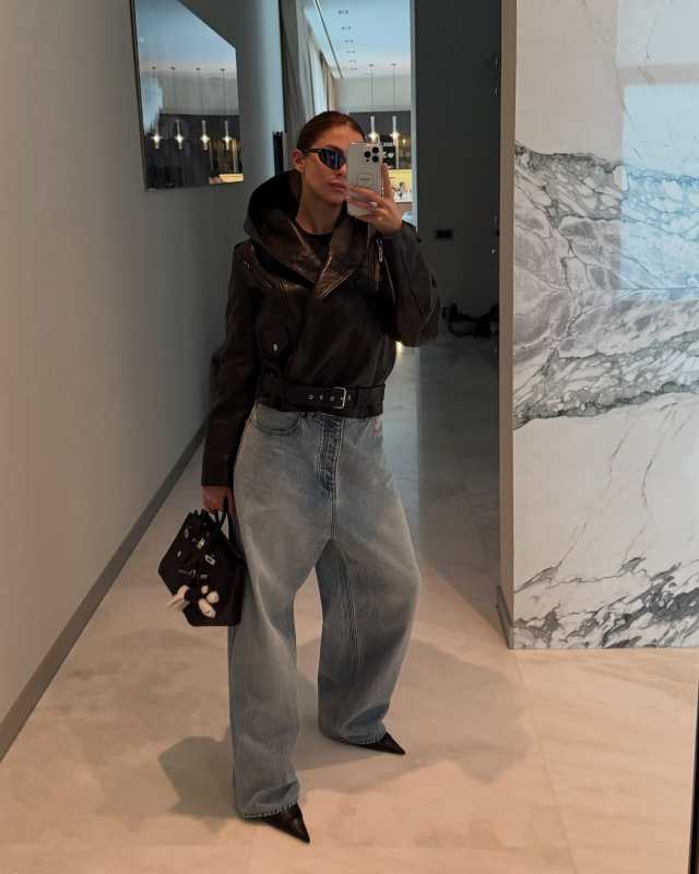ALAIA Hooded Wrap Moto Leather Jacket worn by VIKI ODINTCOVA | VIKI ODINTCOVA Outfits and Style