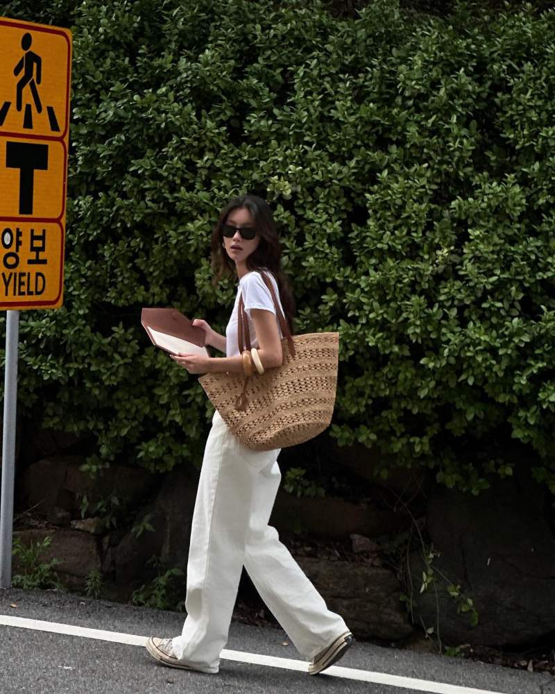 Saint Laurent Panier medium leather-trimmed raffia tote worn by 혜정 | hyejxong__'s closet