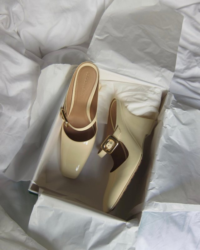Bottega Veneta Yellow Comet Mules worn by Darja Barannik | darjabarannik's closet