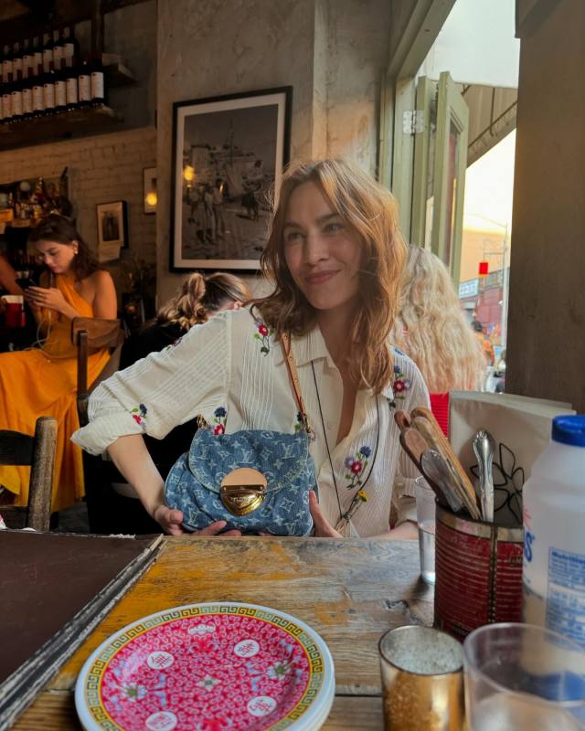 Bode Beaded Wildflower Long Sleeve Cotton Button-Up Shirt and LOUIS VUITTON Sunset Shoulder Bag worn by Alexa Chung | alexachung's closet