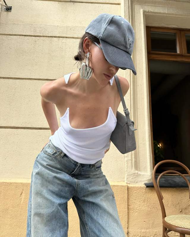 Y/Project White Invisible Strap Tank Top, Y/Project Silver Fuck U Single Earring and Ruslan Baginskiy Hand-Dyed Baseball Cap worn by Nastya Burlaka | burlakanastya's closet