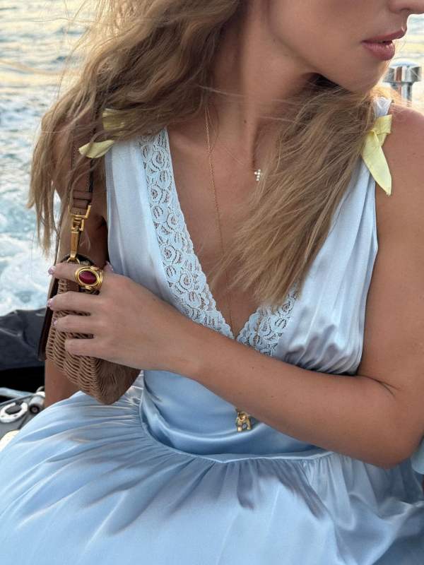 HELSA The Silk Celeste Dress, Saint Laurent Mini VOLTAIRE top handle bag in osier and OLE LYNGGAARD COPENHAGEN Elephant 18-karat gold diamond necklace worn by Viky Rader | Viky Rader Outfits and Style