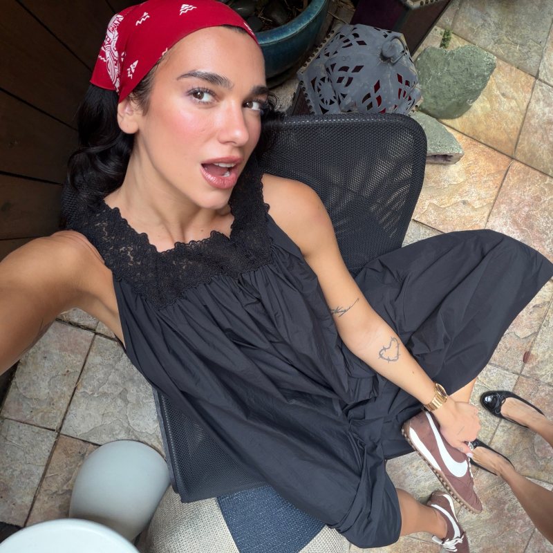 HELSA Midi Dress With Lace in Tech Poplin, BVLGARI Octo Finissimo 37 mm Watch and Moon Shoe Jacquemus + Nike worn by Dua Lipa | Dua Lipa Outfits and Style