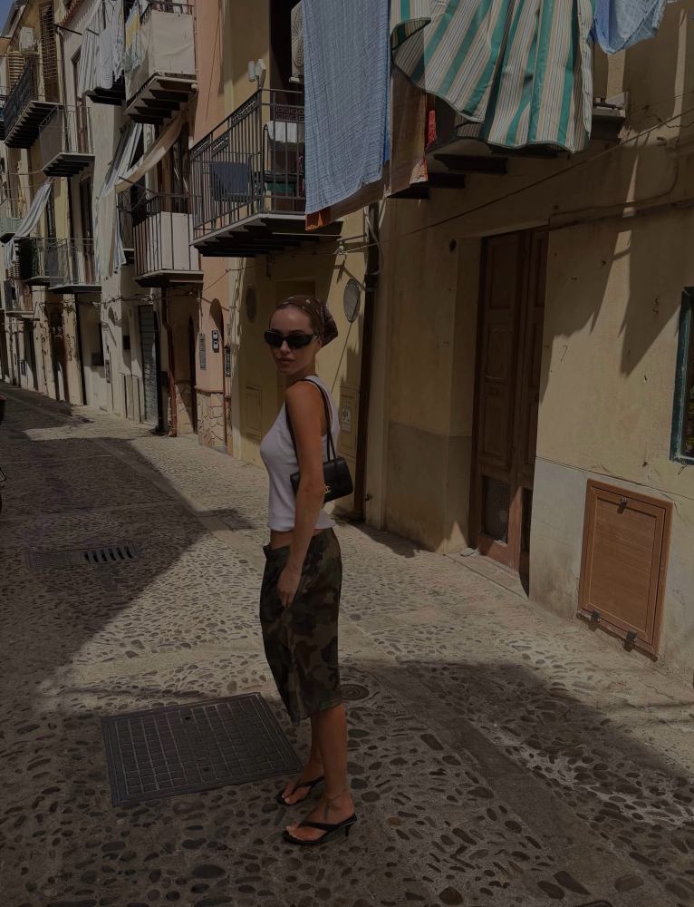 Gucci Women's Vittoria thong, Balenciaga Swift Oval Sunglasses in Black, CHANEL Small Flap Bag, Stussy BASIC MESH SHORT worn by Pernille Teisbaek | Pernille Teisbaek Outfits and Style