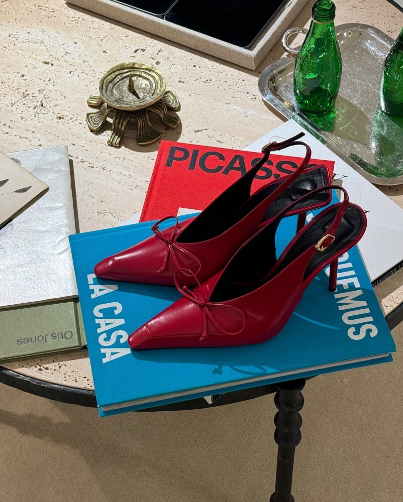 Jacquemus Cubisto bow-detailed leather slingback pumps worn by Elin Warn | elinwarn's closet