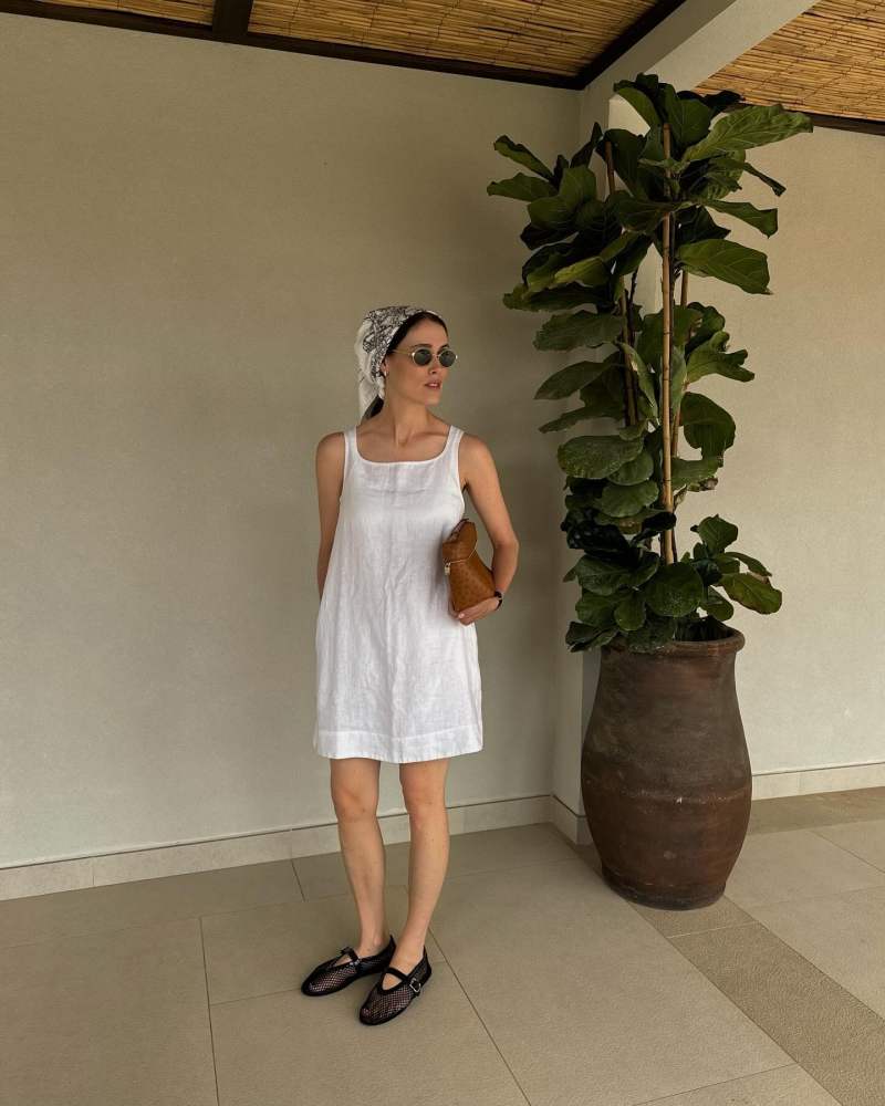 POSSE VAL MINI DRESS, Loro Piana Extra Pocket L27 Ostrich Leather Pouch and ALAIA Mesh Mary Jane Ballerina Flats worn by Annabel Rosendahl | annabelrosendahl's closet
