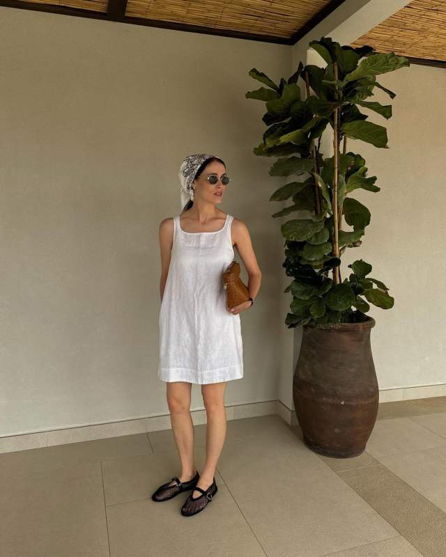 POSSE VAL MINI DRESS, Loro Piana Extra Pocket L27 Ostrich Leather Pouch and ALAIA Mesh Mary Jane Ballerina Flats worn by Annabel Rosendahl | annabelrosendahl's closet