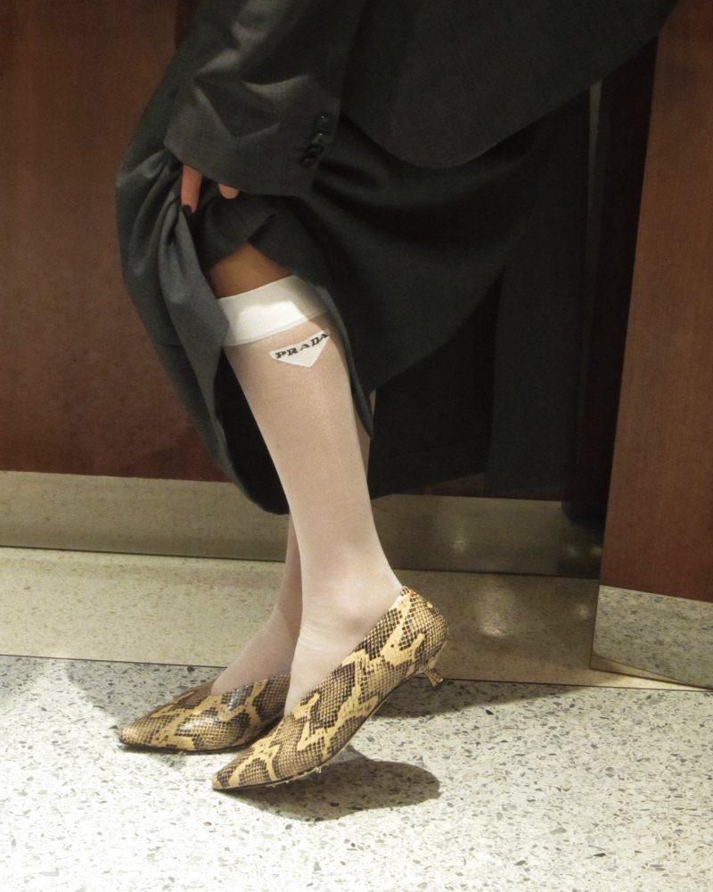 AEYDE Clara Snake-Effect Leather Pumps and PRADA Logo-embroidered Mesh Knee Socks worn by Josefine Haaning Jensen | josefinehj's closet