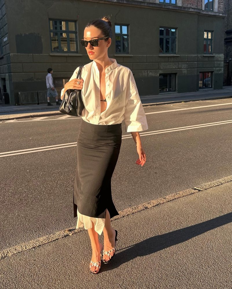 The Garment Black Treviso Midi Skirt, Magda Butrym Brigitte Small leather tote bag, Vintage Manolo Blahnik Sandals and MKDT Studio White Shirt worn by Ilirida Krasniqi | iliridakrasniqi's closet
