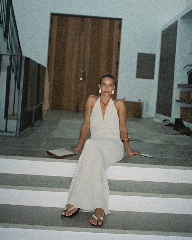 Saint Laurent Medium Uptown pouch and The Row Gray Charm Beach Sandals worn by Rosie Huntington-Whiteley | rosiehw's closet
