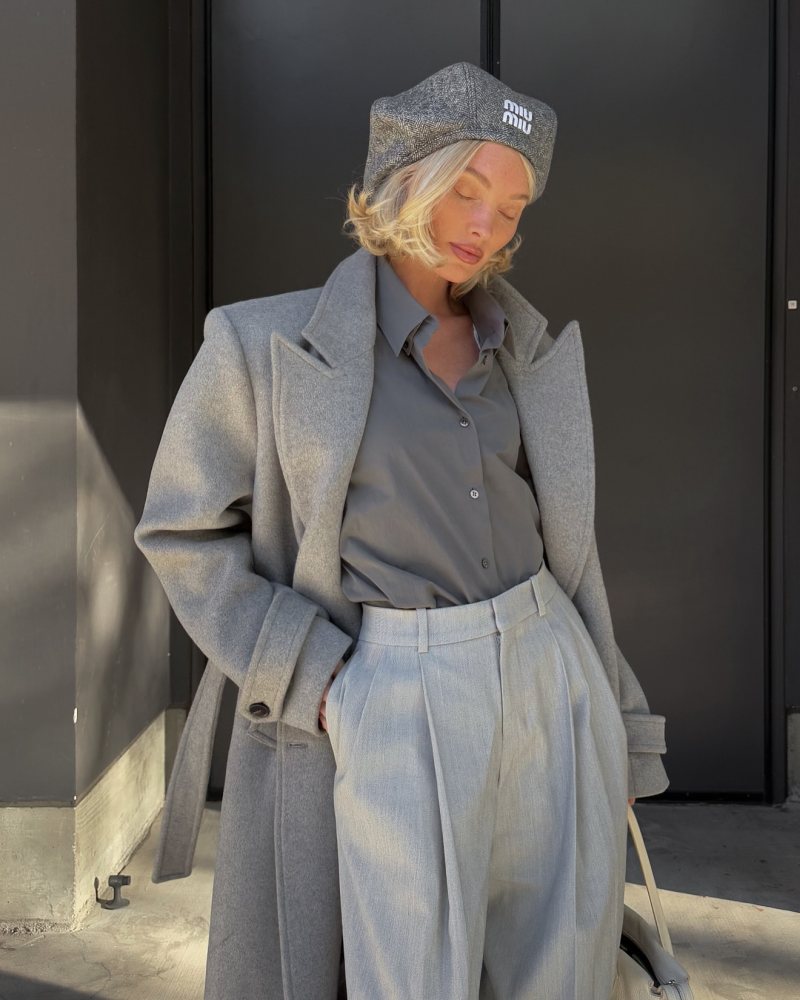 Jacquemus Le Pantalon Curzio cotton blend pants, New Balance X Miu Miu 530 SL suede and mesh sneakers, HELSA Bold Shoulder Long Coat, THE ROW Dela Double-Collar Shirt, THE ROW Pebbled Leather Top Handle Bag and MIU MIU Wool chevron beret worn by Elsa Hosk | hoskelsa's closet