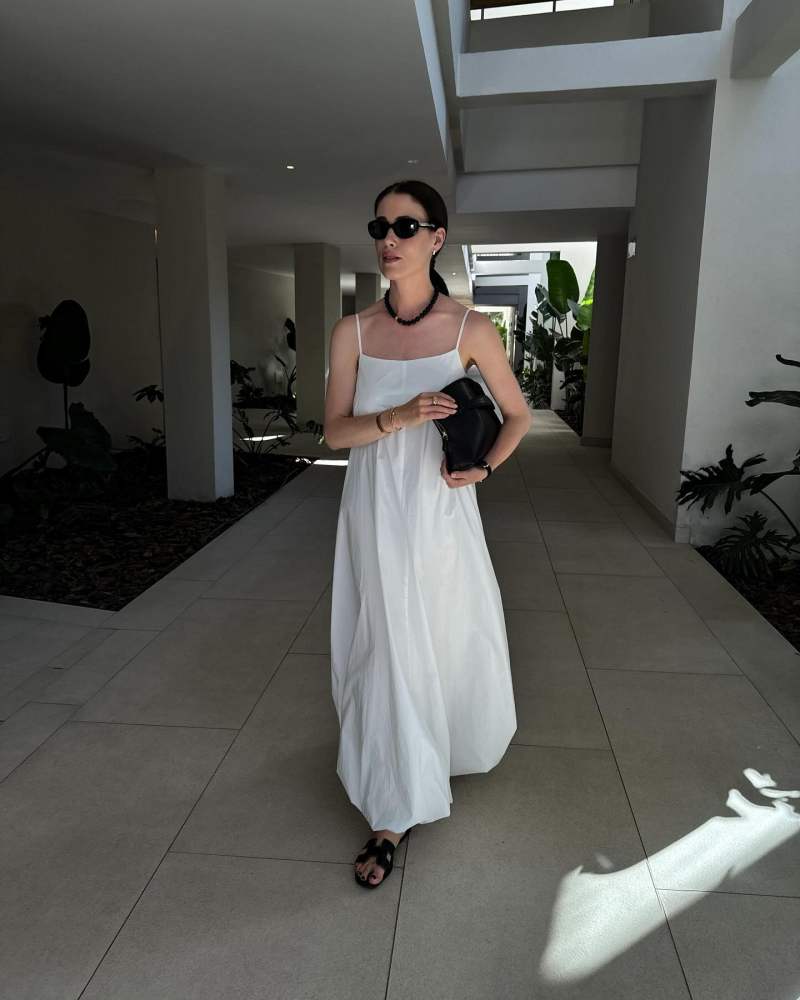 The Row Ellie leather clutch and The Garment Cyprus Long Dress worn by Annabel Rosendahl | annabelrosendahl's closet