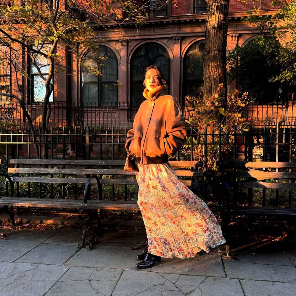 Khaite Shellar Jacket in Classic Brown Leather, Khaite Taja Dress in Cream Multi and LOUIS VUITTON Nano Boulogne worn by Alexa Chung | Alexa Chung Outfits and Style