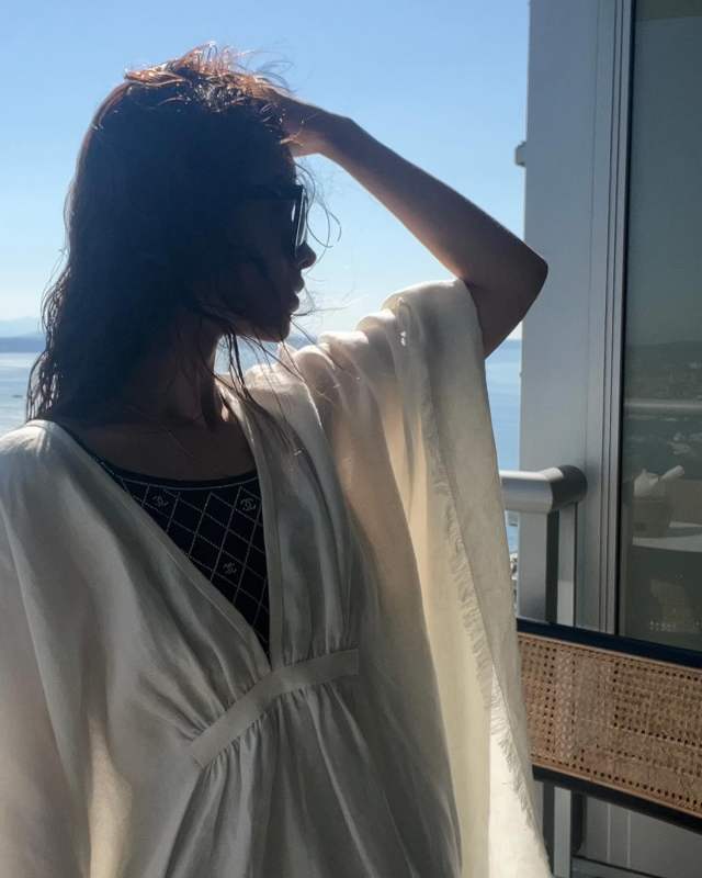 Loro Piana Gloria frayed gathered linen maxi dress and CHANEL Swimsuit worn by wwwwwzwwwwww | wwwwwzwwwwww's closet