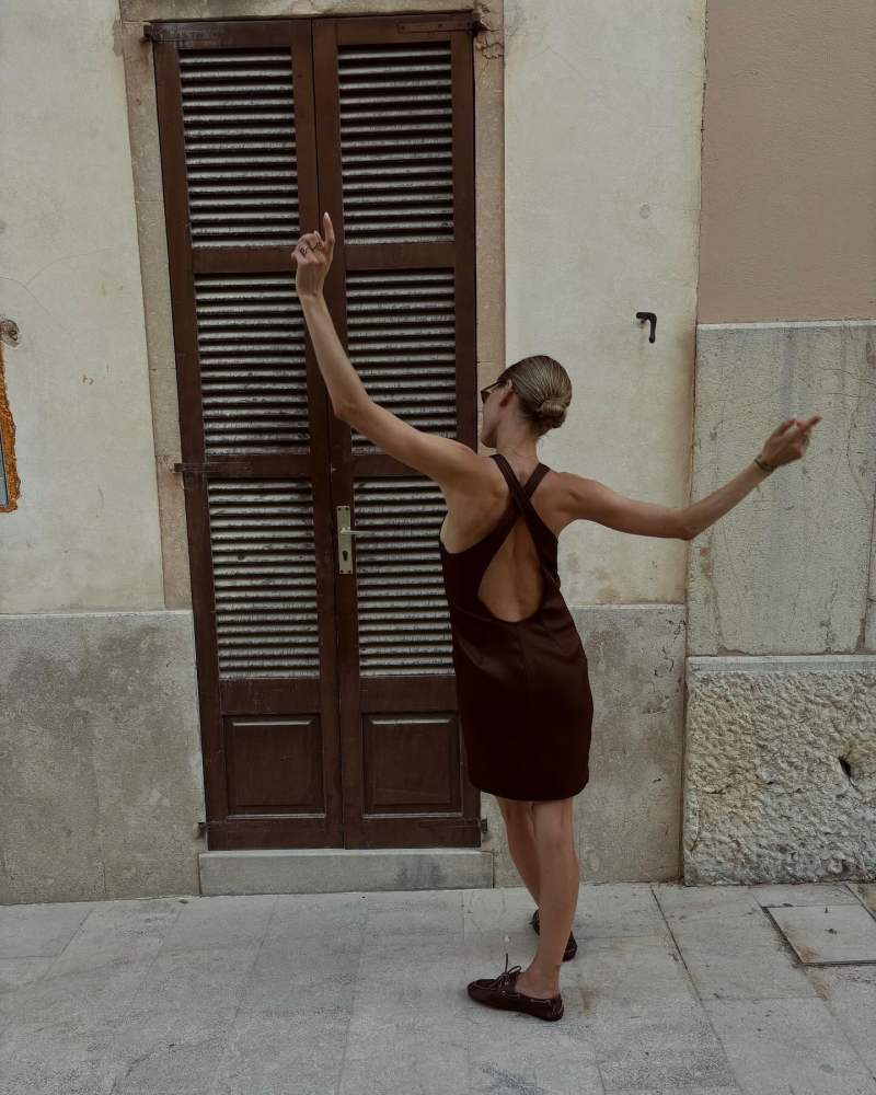 Saint Laurent CROSS-BACK DRESS IN STRETCH DUCHESS SILK and MIU MIU Unlined bleached leather loafers worn by Pernille Teisbaek | pernilleteisbaek's closet