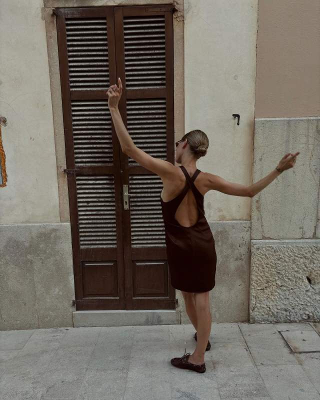 Saint Laurent CROSS-BACK DRESS IN STRETCH DUCHESS SILK and MIU MIU Unlined bleached leather loafers worn by Pernille Teisbaek | pernilleteisbaek's closet