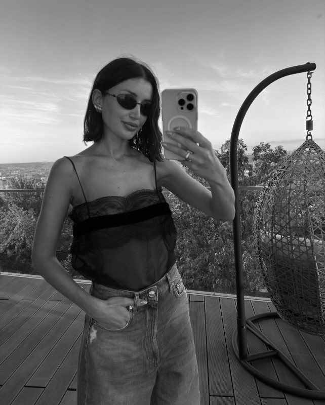 SAINT LAURENT Lace-trimmed silk-tulle camisole worn by Madina Uysal | madinauysal's closet