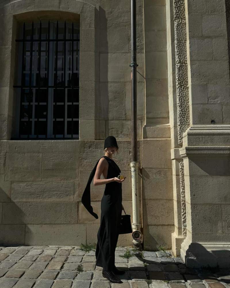 ROHE scarf-detail open-back dress, LA COLLECTION Madelyn hat and Hermès Barenia Eau De Parfum worn by Christie Tyler | christietyler's closet
