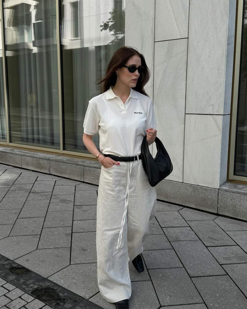 THE ROW Small Everyday Shoulder Bag, MIU MIU Cotton piqué polo shirt and HERMES Groupie Mule worn by Annabel Rosendahl | annabelrosendahl's closet
