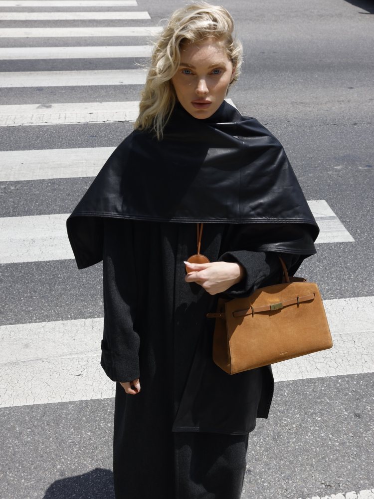 Saint Laurent long coat in brushed cashmere and wool, NOUR HAMMOUR edra Sleek Leather Cape, Loro Piana Rebecca Calfskin Ballerina Flats, HERMES Mirror accessory worn by Elsa Hosk | Elsa Hosk Outfits and Style