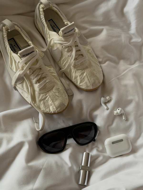 Nike x Jacquemus Moon Shoe sneakers worn by Marie Sander Persson | Marie Sander Persson Outfits and Style