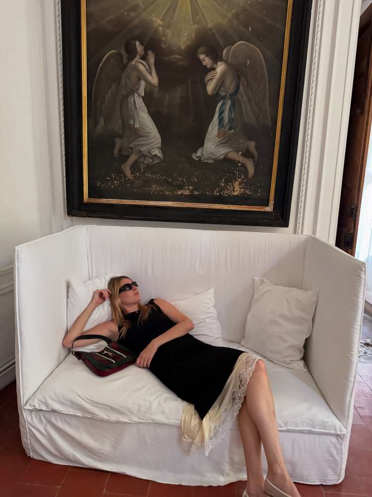 Balenciaga Swift oval sunglasses, BALENCIAGA Lingerie Tailored Skirt in Black and Gucci Jackie python shoulder bag worn by Camille Charriere | Camille Charriere Outfits and Style