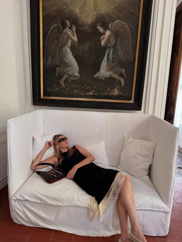 Balenciaga Swift oval sunglasses, BALENCIAGA Lingerie Tailored Skirt in Black and Gucci Jackie python shoulder bag worn by Camille Charriere | Camille Charriere Outfits and Style