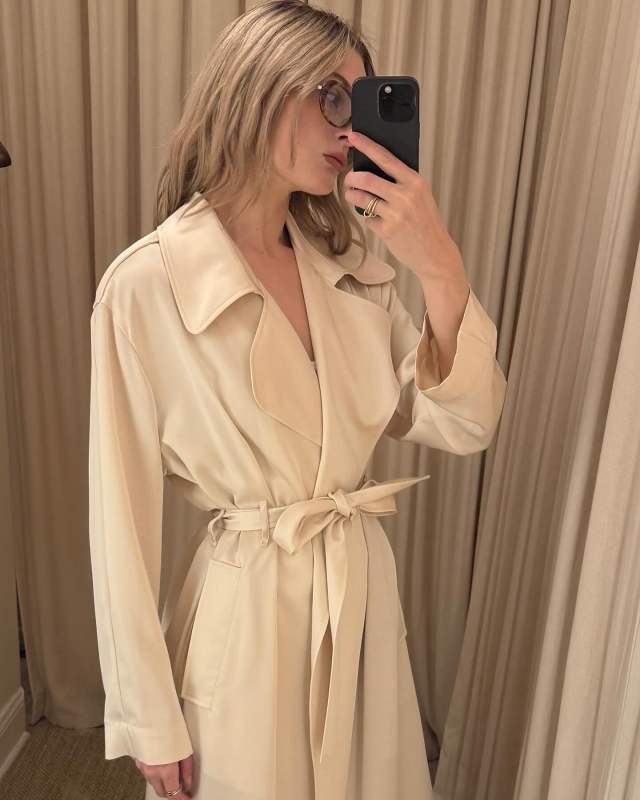 Leset Barb belted satin trench coat worn by Christie Tyler | Christie Tyler Outfits and Style