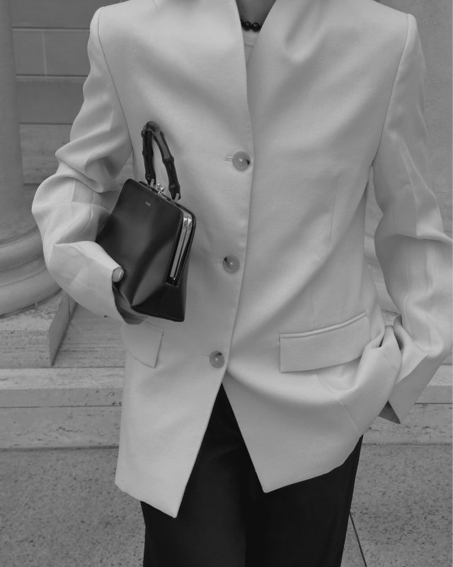 Toteme Overlay Single-breasted blazer and Jil Sander Goji Medium Bamboo Top Handle Bag worn by Şirin Haban | creativeecho's closet