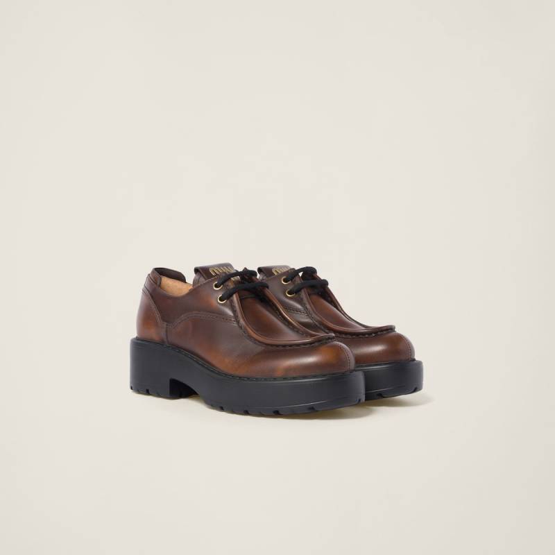 MIU MIU Laced fumé leather shoes