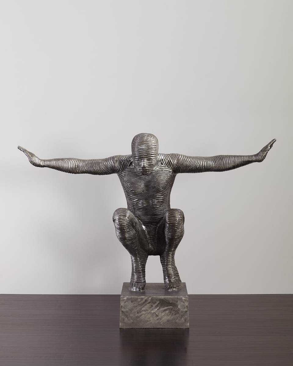 Squatting Man Sculpture