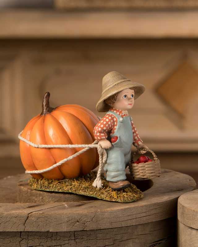 Paulie Pulling Pumpkin Figurine