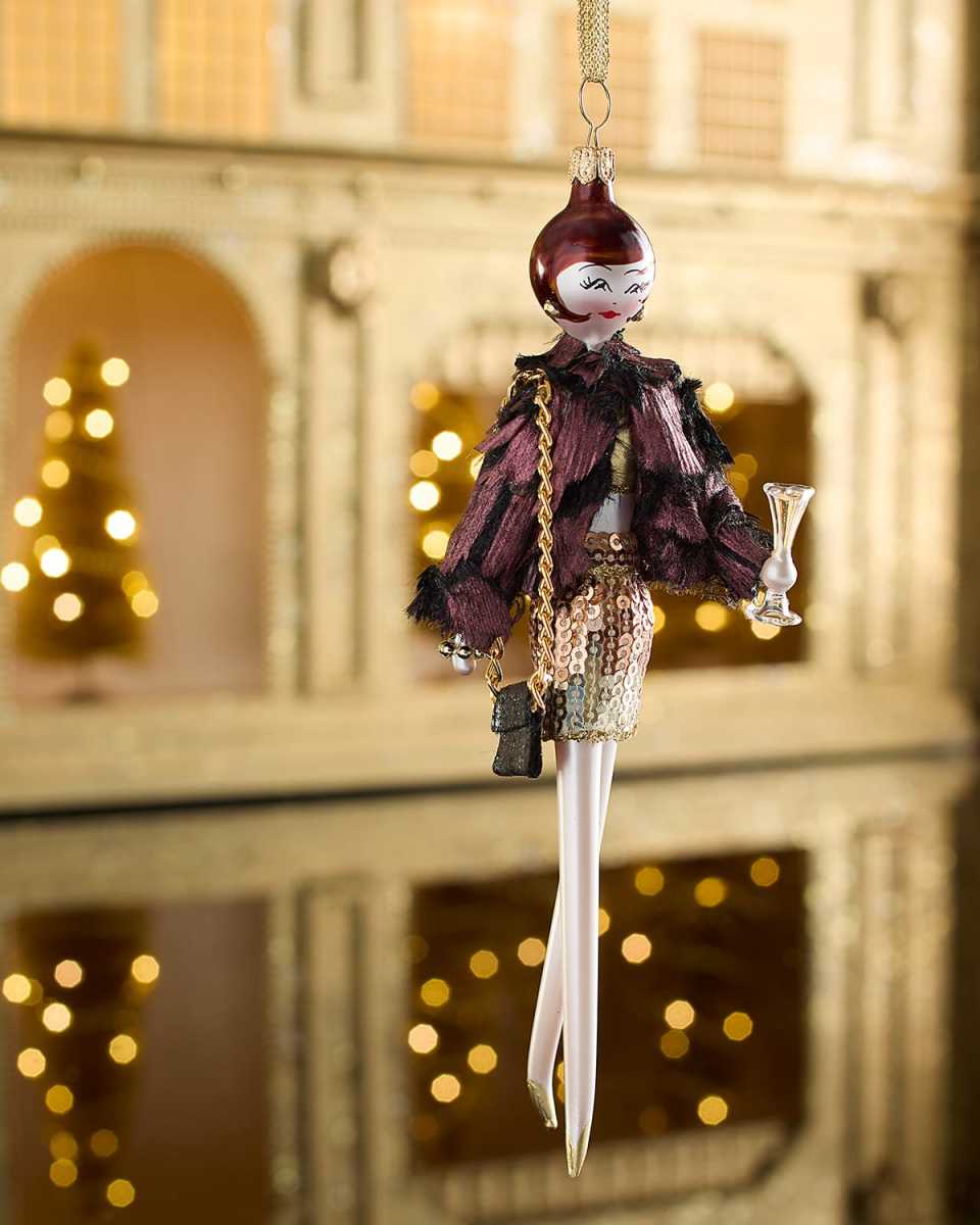Fashionista in Textured Jacket with Glass Christmas Ornament