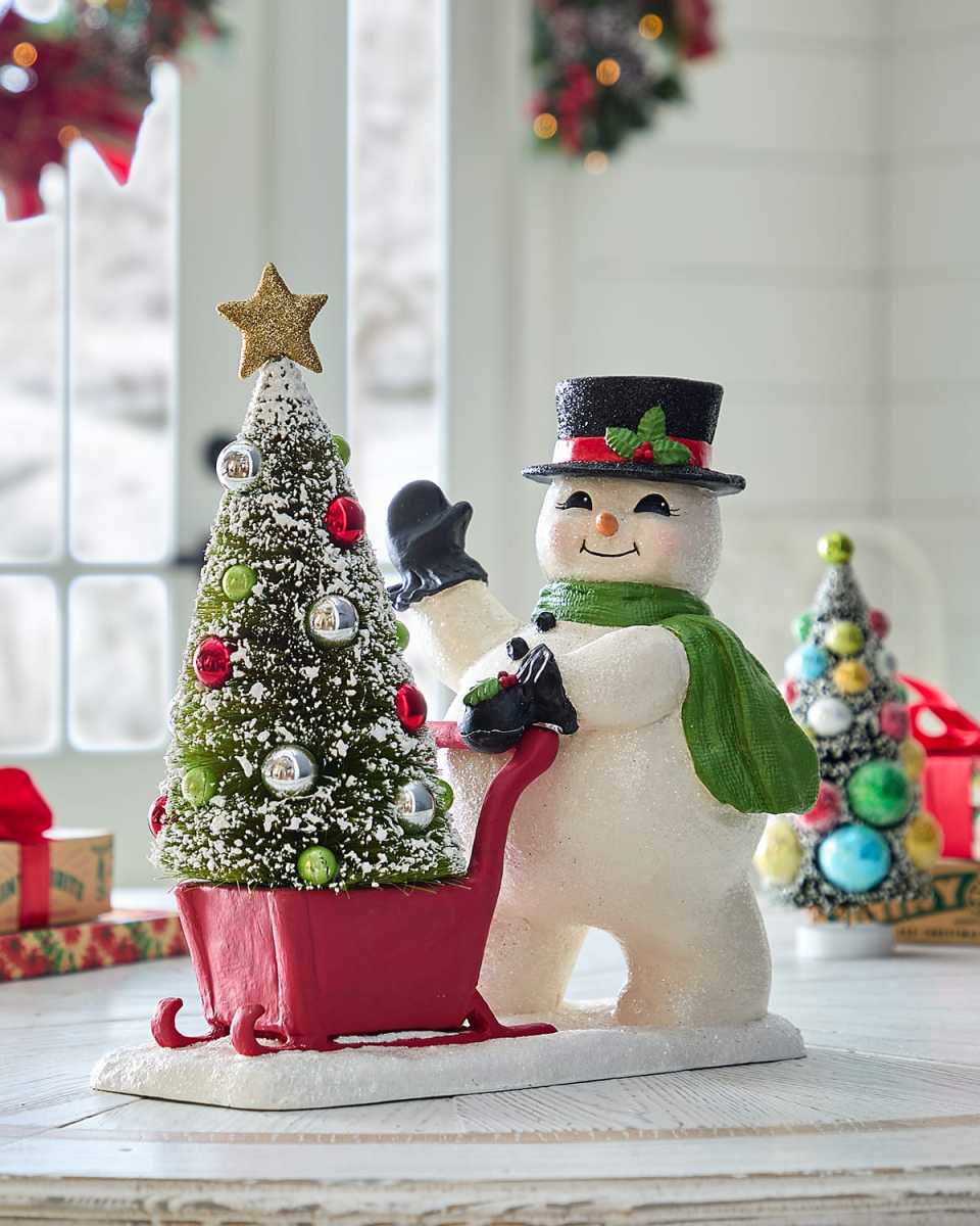Frosty Pushing Sled Christmas Decoration