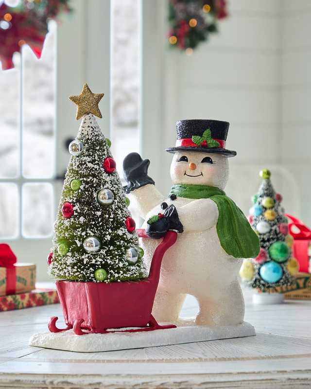 Frosty Pushing Sled Christmas Decoration