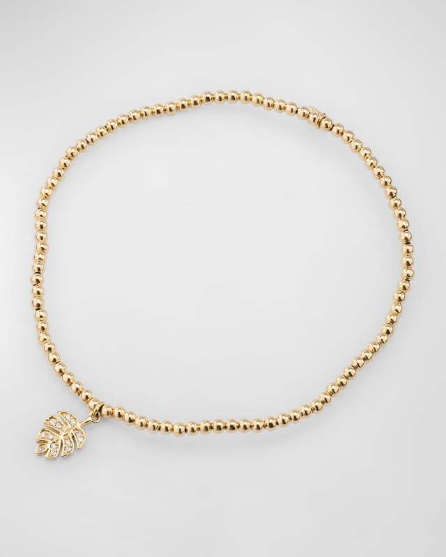 Tiny Monstera Leaf Charm on 14K Gold Beaded Bracelet