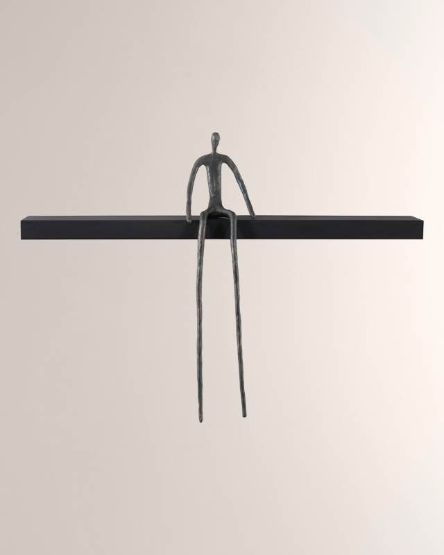 Moveable Sitting Man on Long Shelf, A