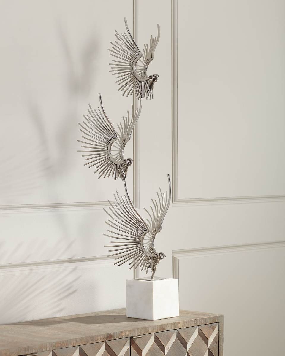 Sculpted Birds In Flight